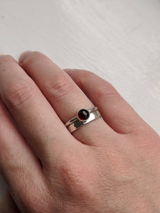 Hammered silver stacking ring and silver garnet gemstone ring