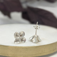 Load image into Gallery viewer, Flower stud earring made from recycled silver.
