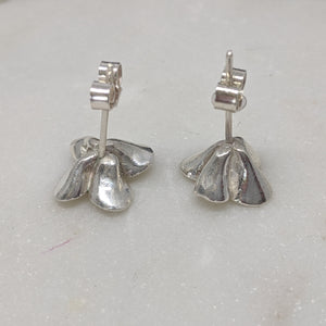 Recycled silver flower stud earring with butterfly backs.