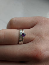 Load image into Gallery viewer, Purple amethyst ring with a chunky textured plain silver band. Stacked together as a set.
