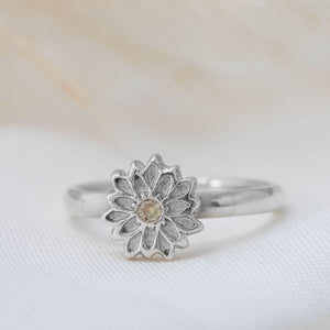 Silver flower ring with cubic zirconia