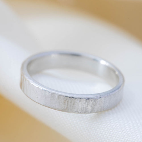 Line textured silver stacking ring