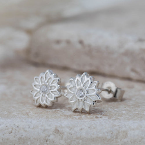 silver flower stud earrings with cubic zirconias