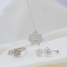 Load image into Gallery viewer, collection of silver jewellery, silver ring with cubic zirconia, silver flow pendant on chain and flower stud earrings.
