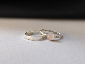 rose quartz ring with twisted band and paired with with hammered band