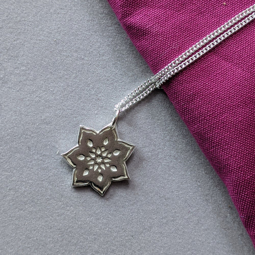Handmade silver flower pendant