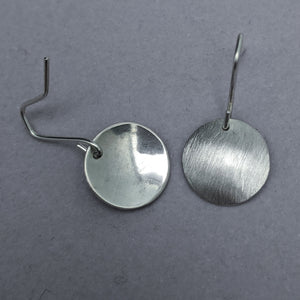 Back and Front side of silver circle drop earrings 