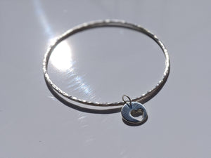 Handmade silver bangle bracelet with heart charm