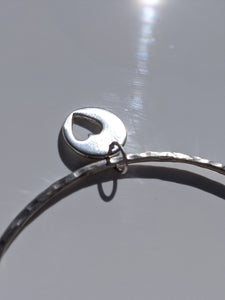 solid silver hammered bangle and silver heart charm