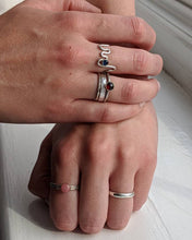 Load image into Gallery viewer, Selection of silver stackable rings featuring gemstones
