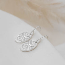 Load image into Gallery viewer, Silver oval drop earrings with indented detail
