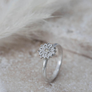 Silver flower ring with cubic zirconia